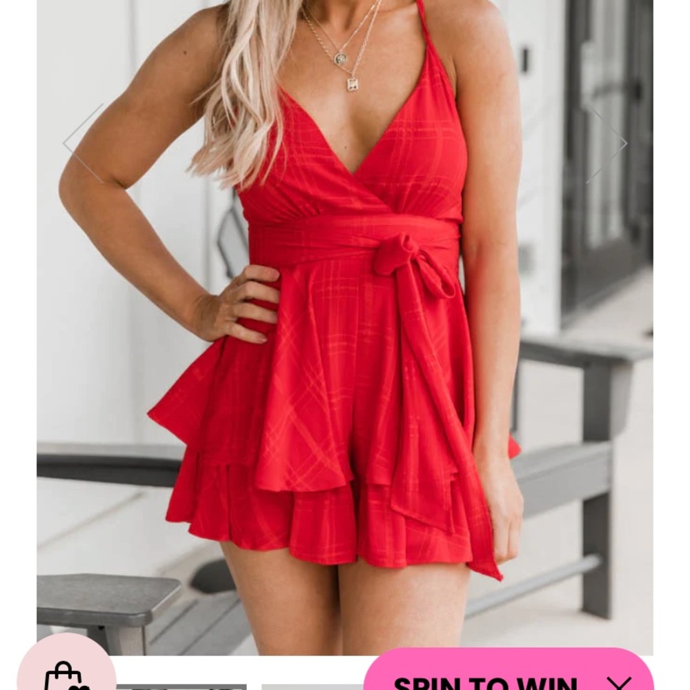 Pink Lily, red romper. Size M